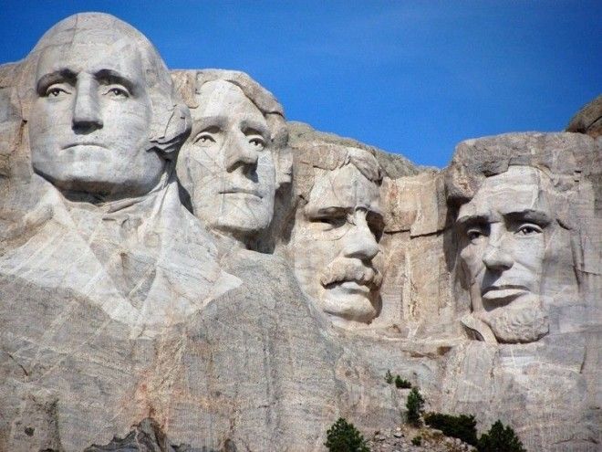 В Южной Дакоте США на горе Рашмор находится всемирно известный мемориал американским президентам Джордж Вашингтон Томас Джефферсон Теодор Рузвельт и Авраам Линкольн Скульптуры интересное скалы