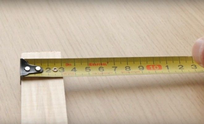 Измерение рулеткой с захватом предмета